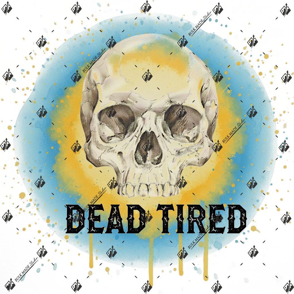 a skull with the text "DEAD TIRED" written below it.
